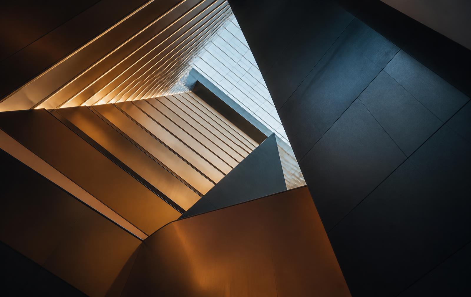 Abstract architectural forms rising toward the sky